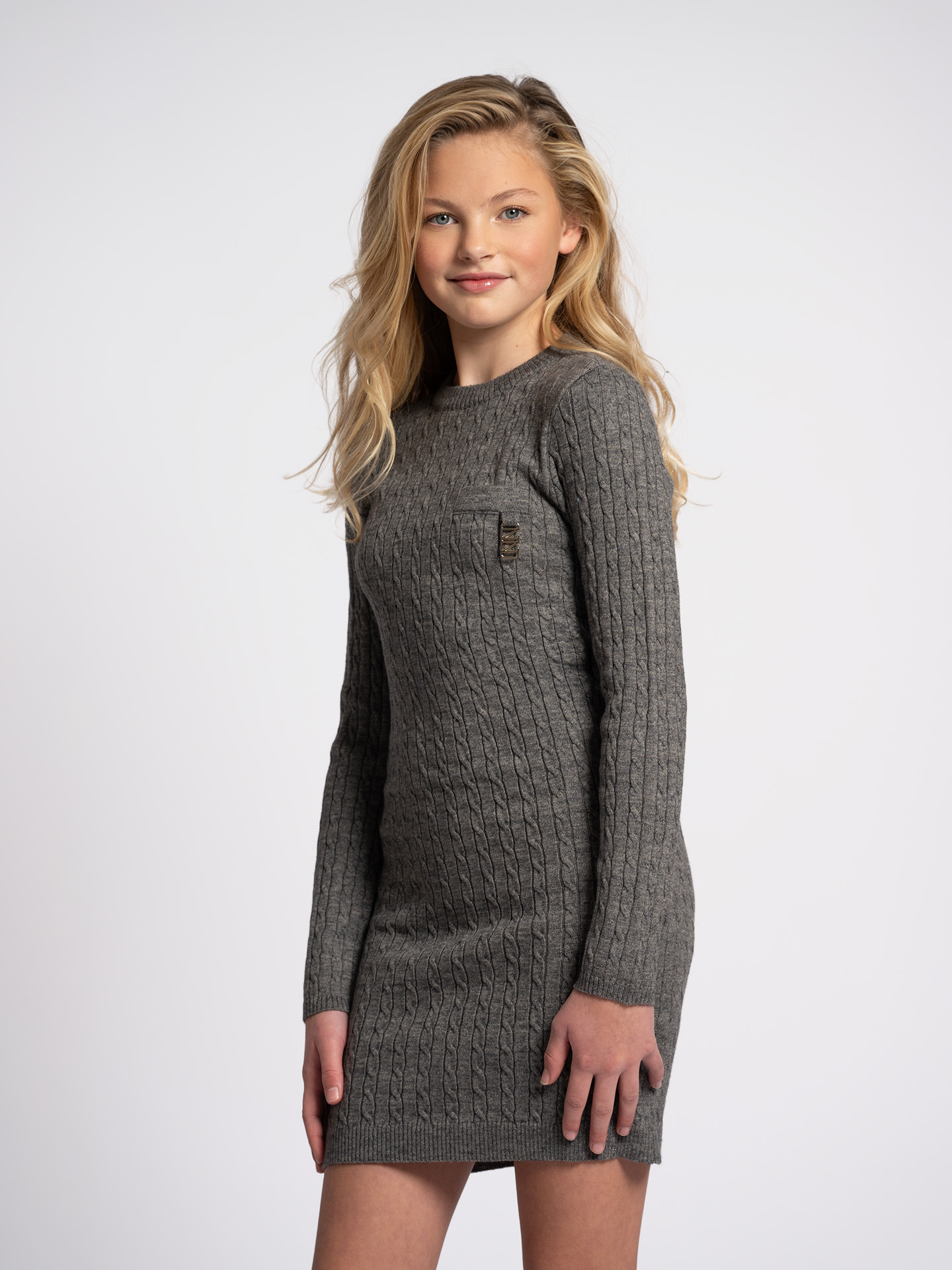 Knitted dress with cable pattern