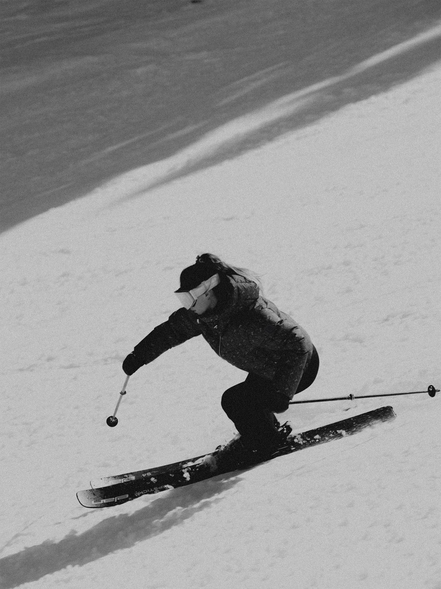 Ski puffer jacket with logo pattern