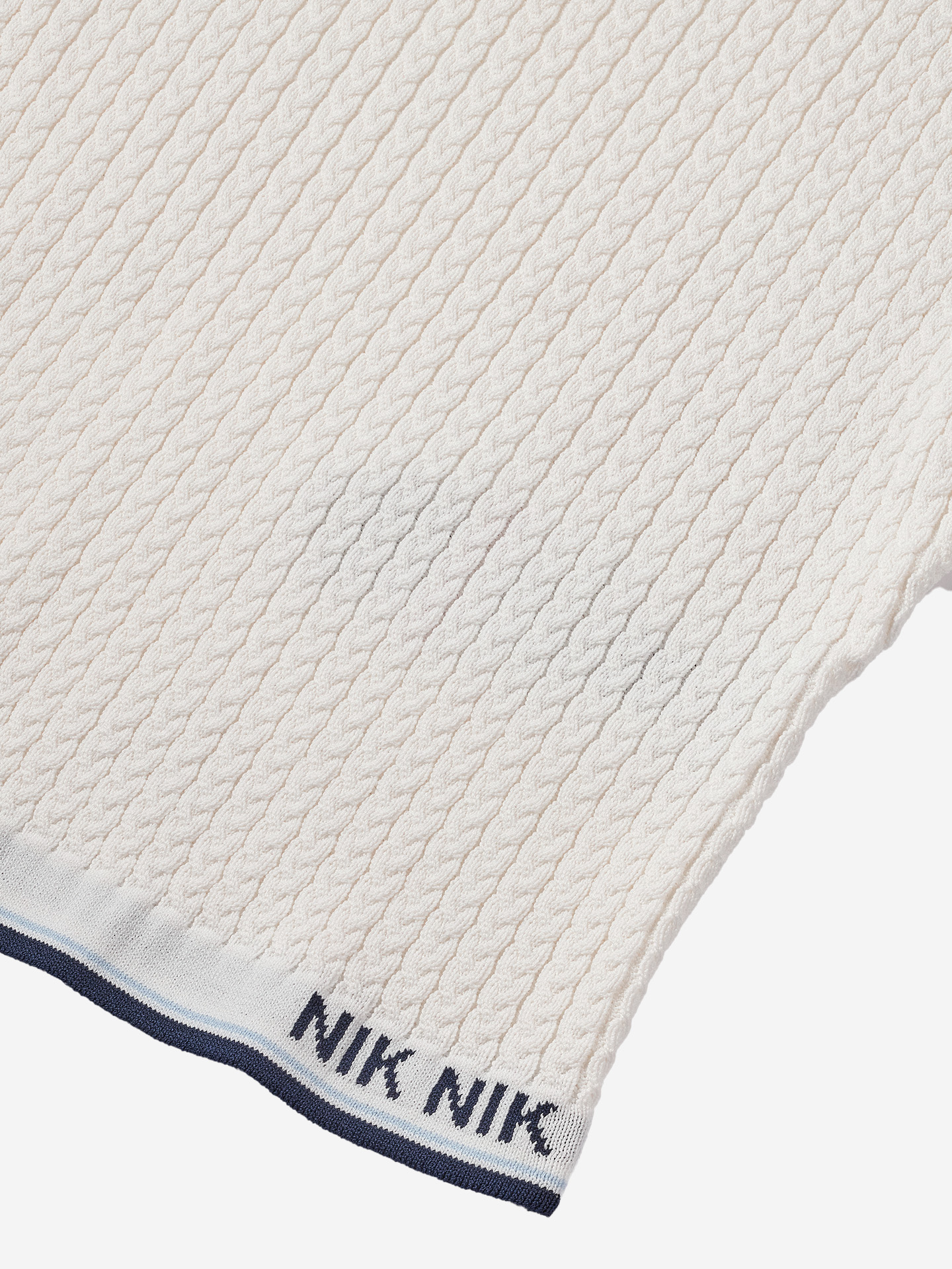 Knitted top with herringbone structure