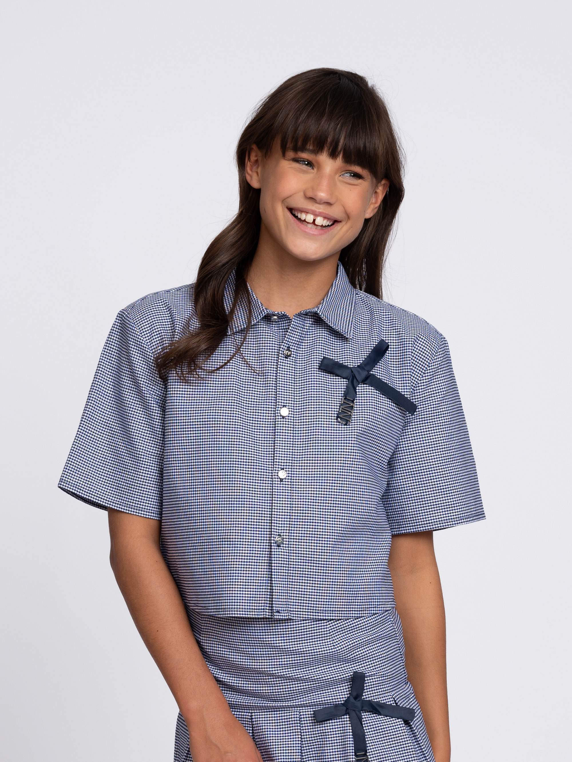 Short checked blouse with bow detail