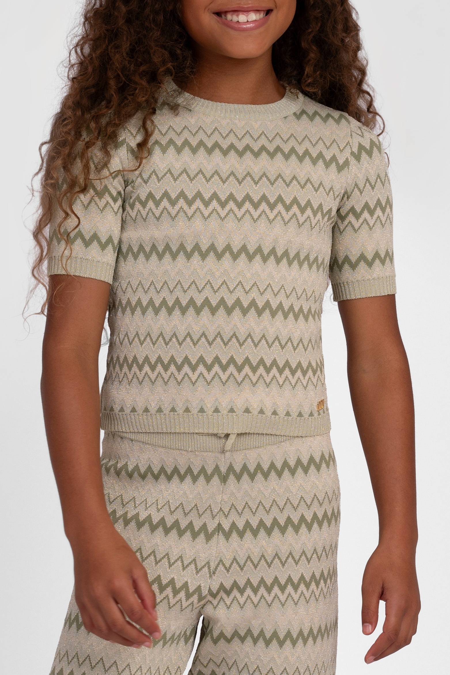 Top with zigzag pattern and glitter thread