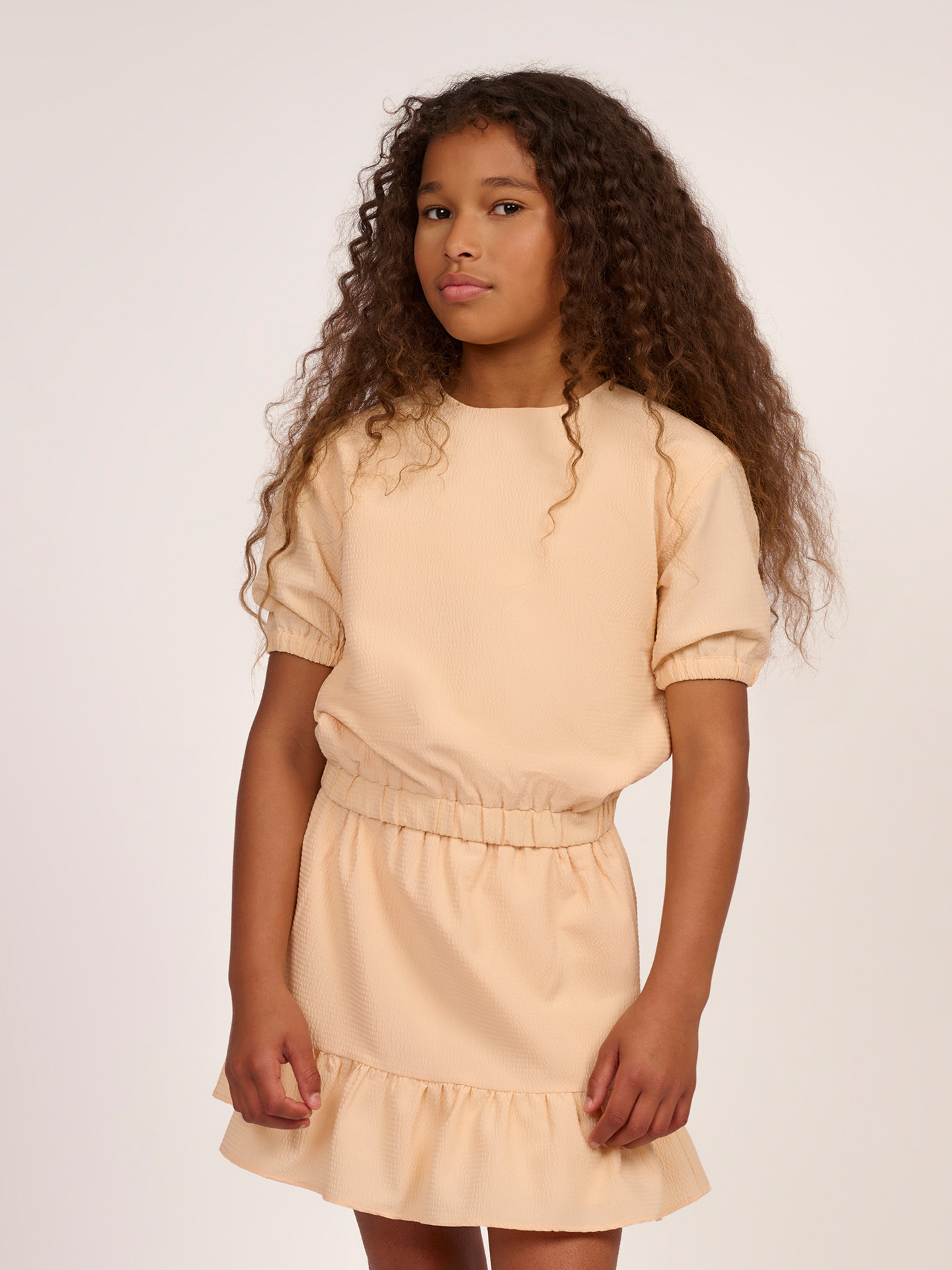 Cropped top met pofmouwen