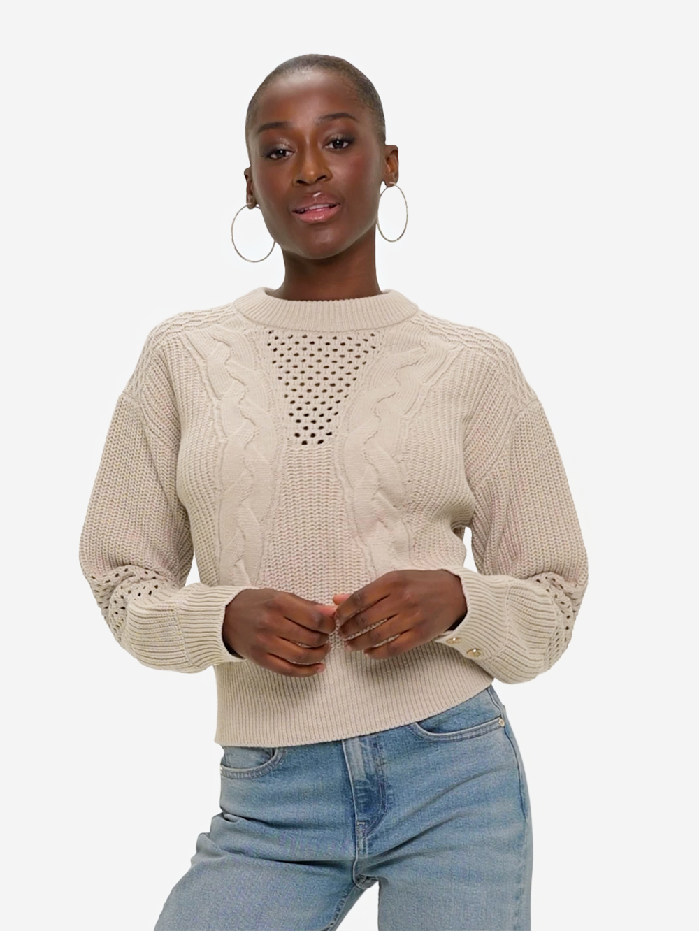 Gebreide trui met verschillende texturen