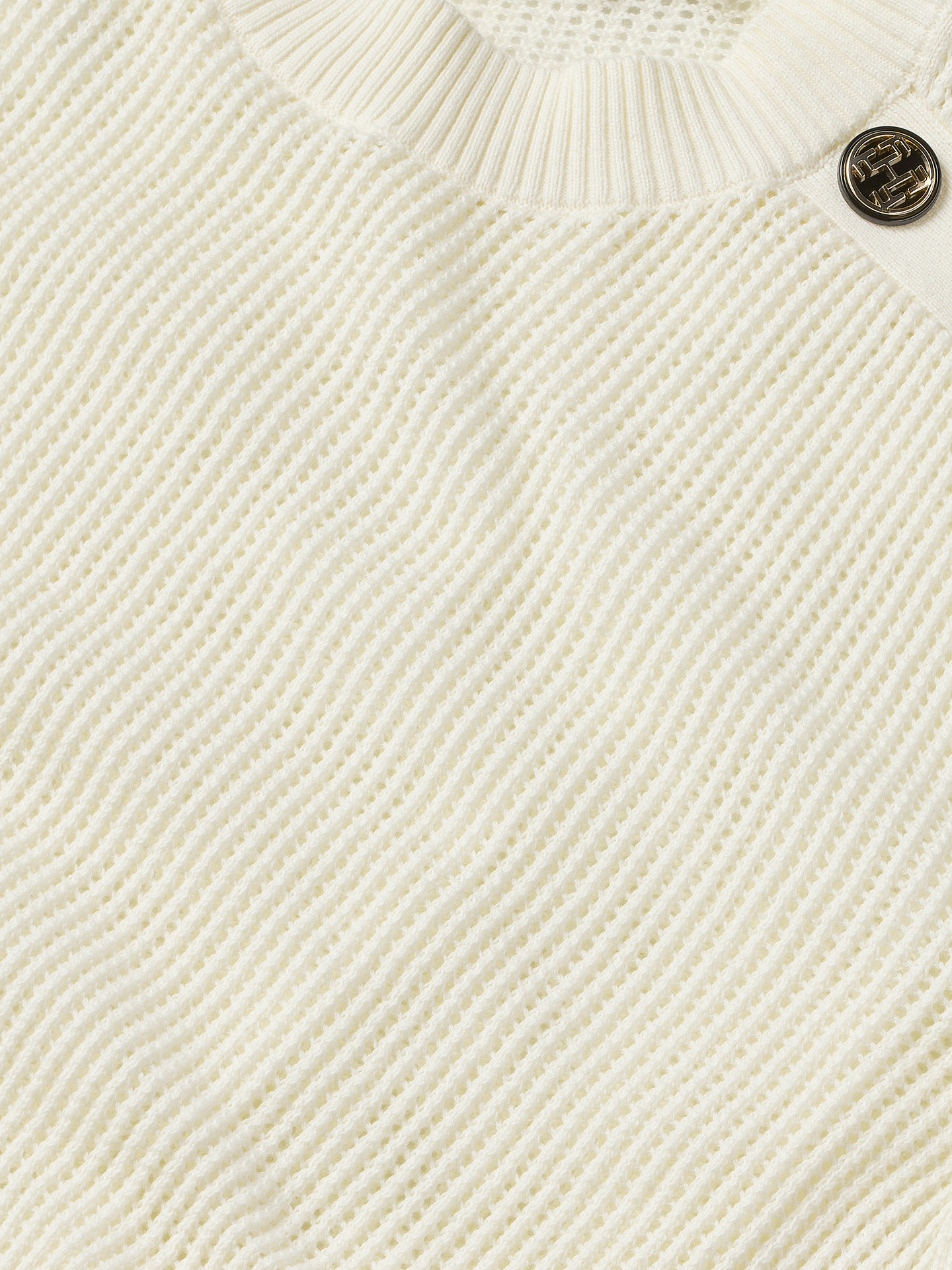 Open knit top with button details