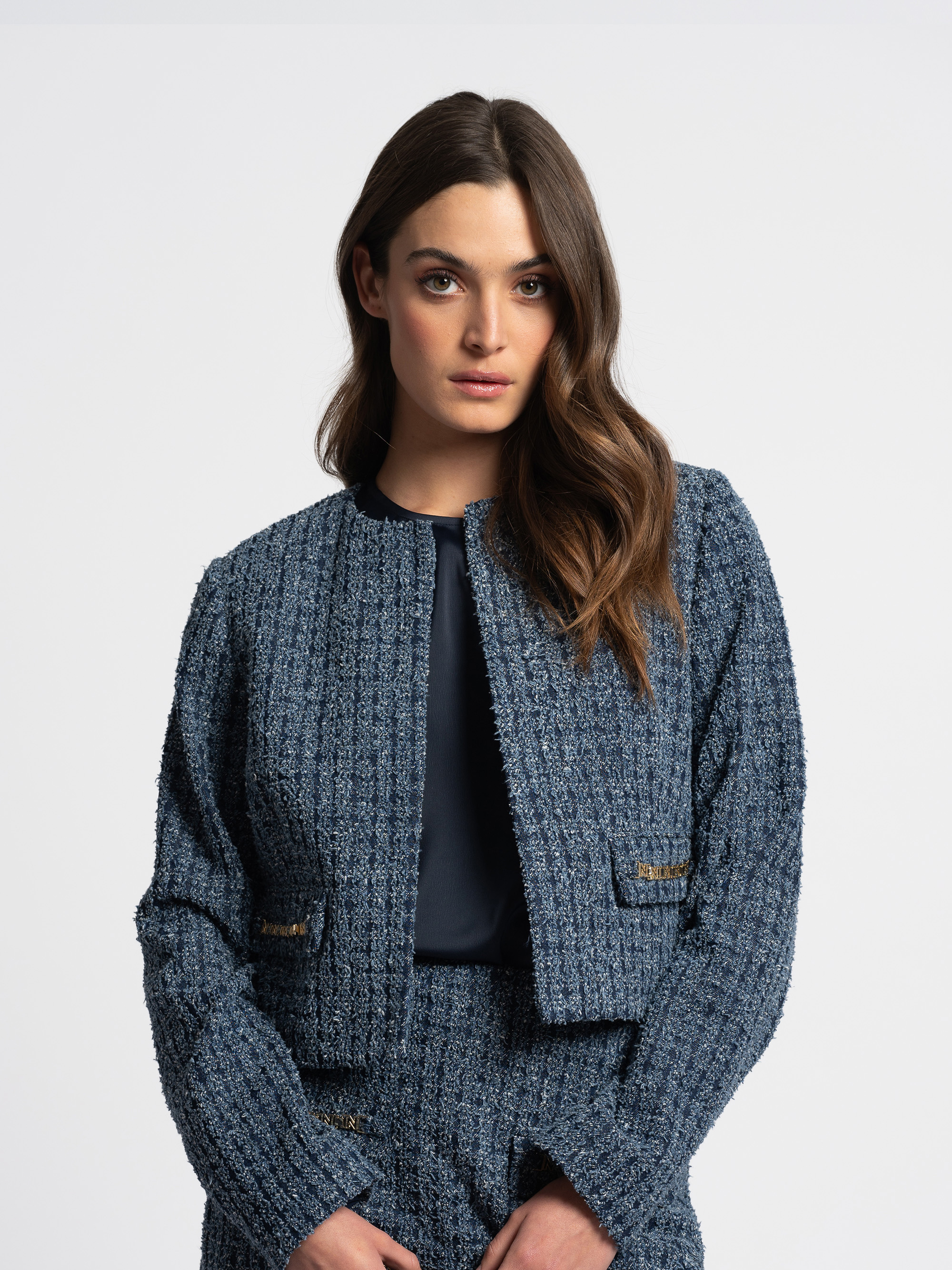 Tweed jack met kettingdetails