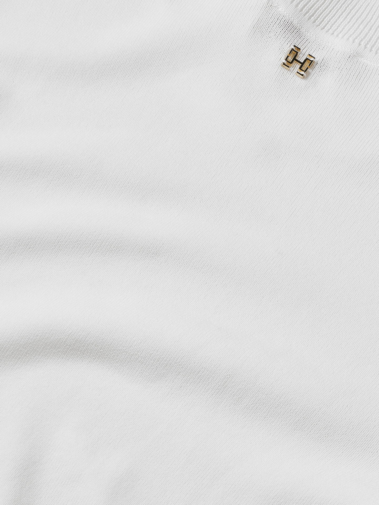 Top with scalloped hem