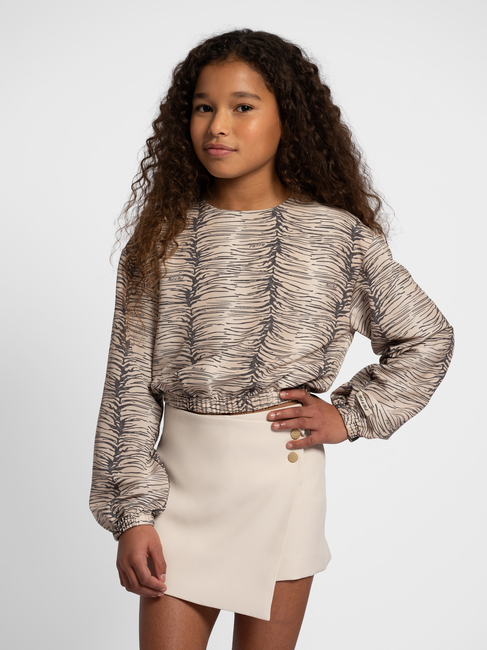 Skort with asymmetrical overlap