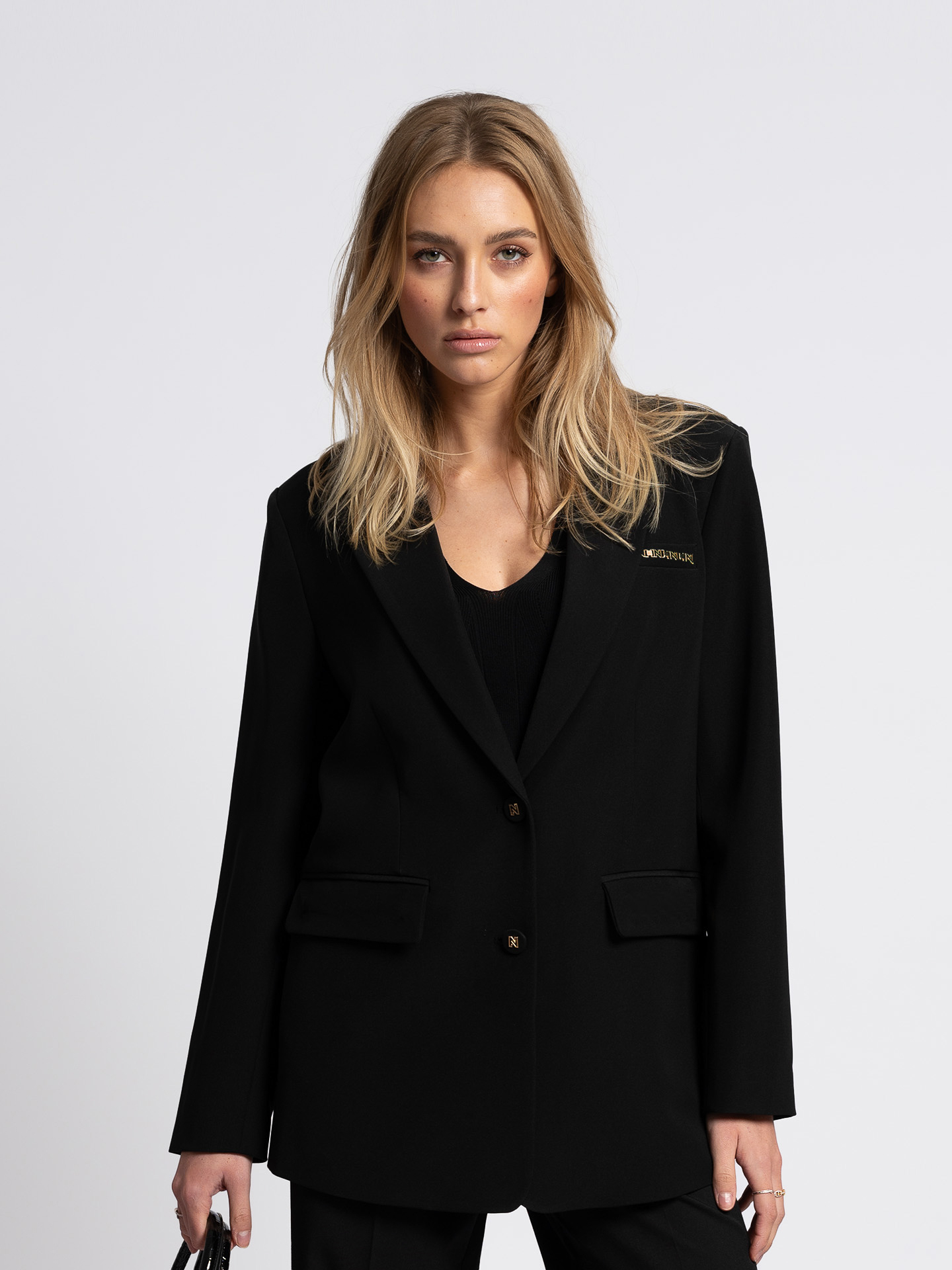 Oversized blazer met ketting detail