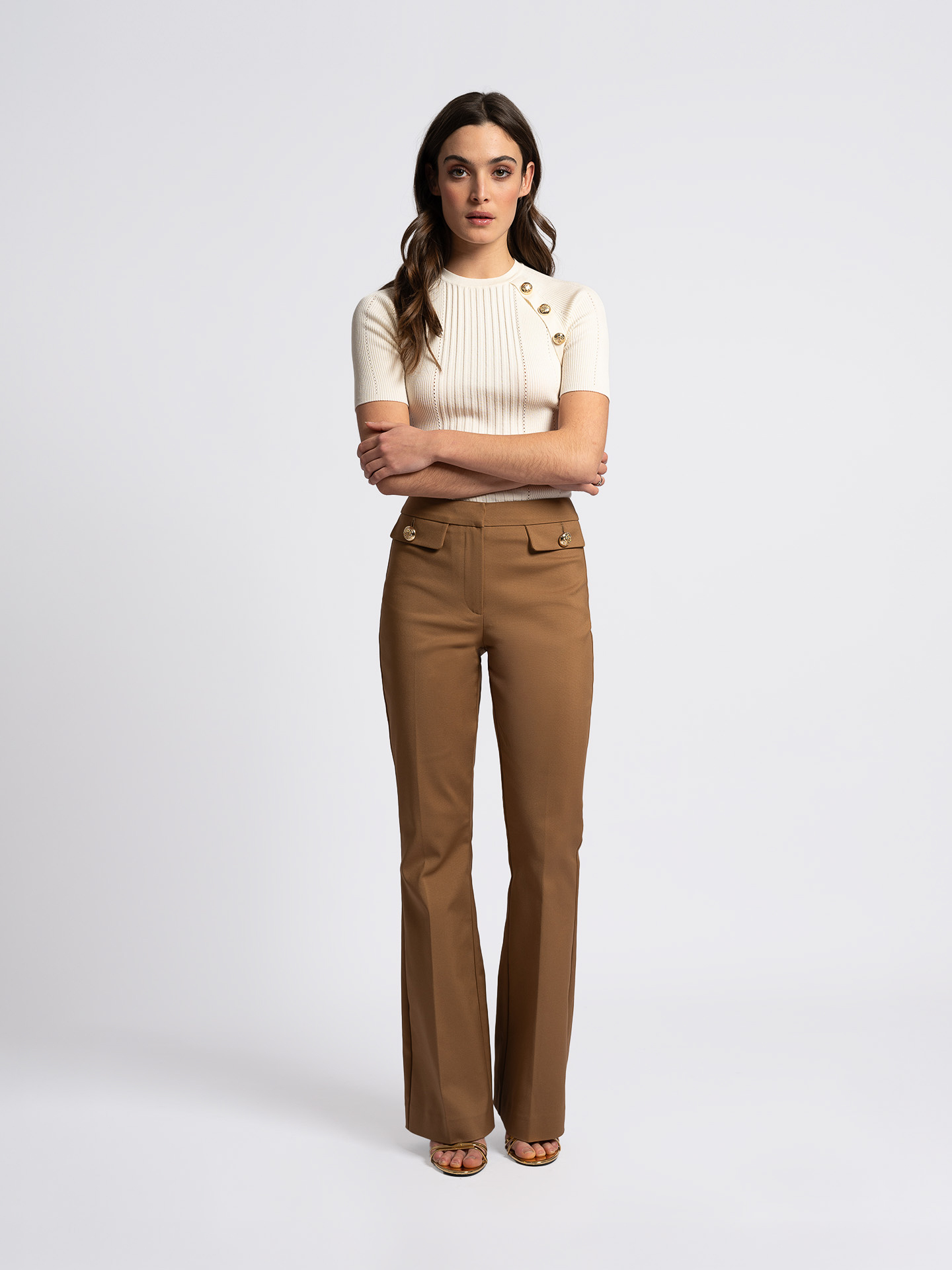 Flared trousers with button details