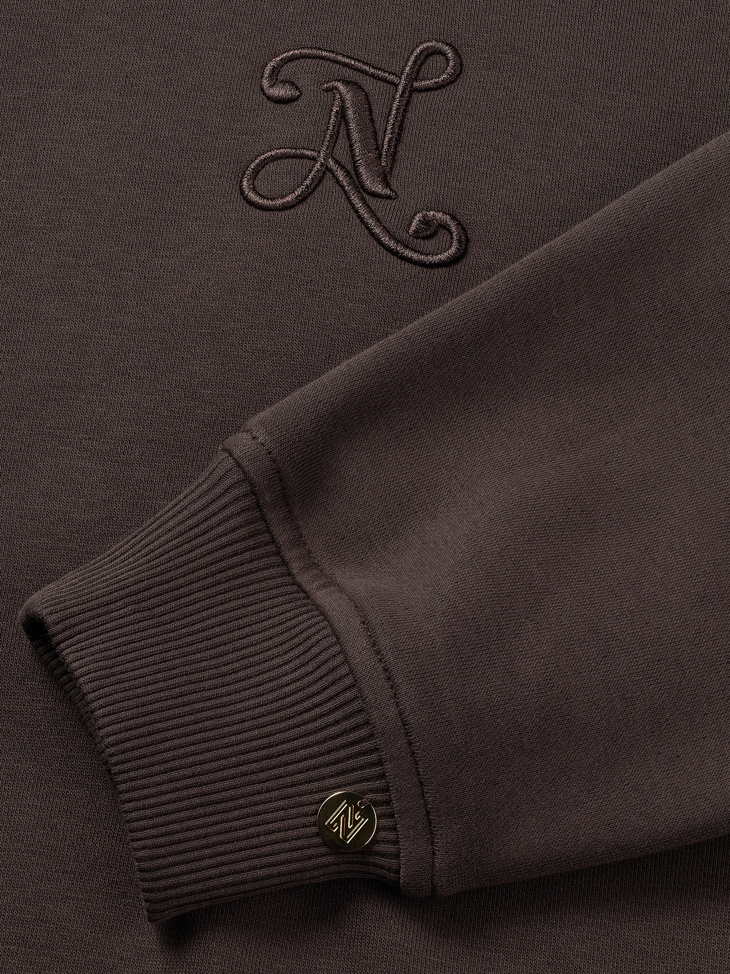 Sweater with embroidered logo