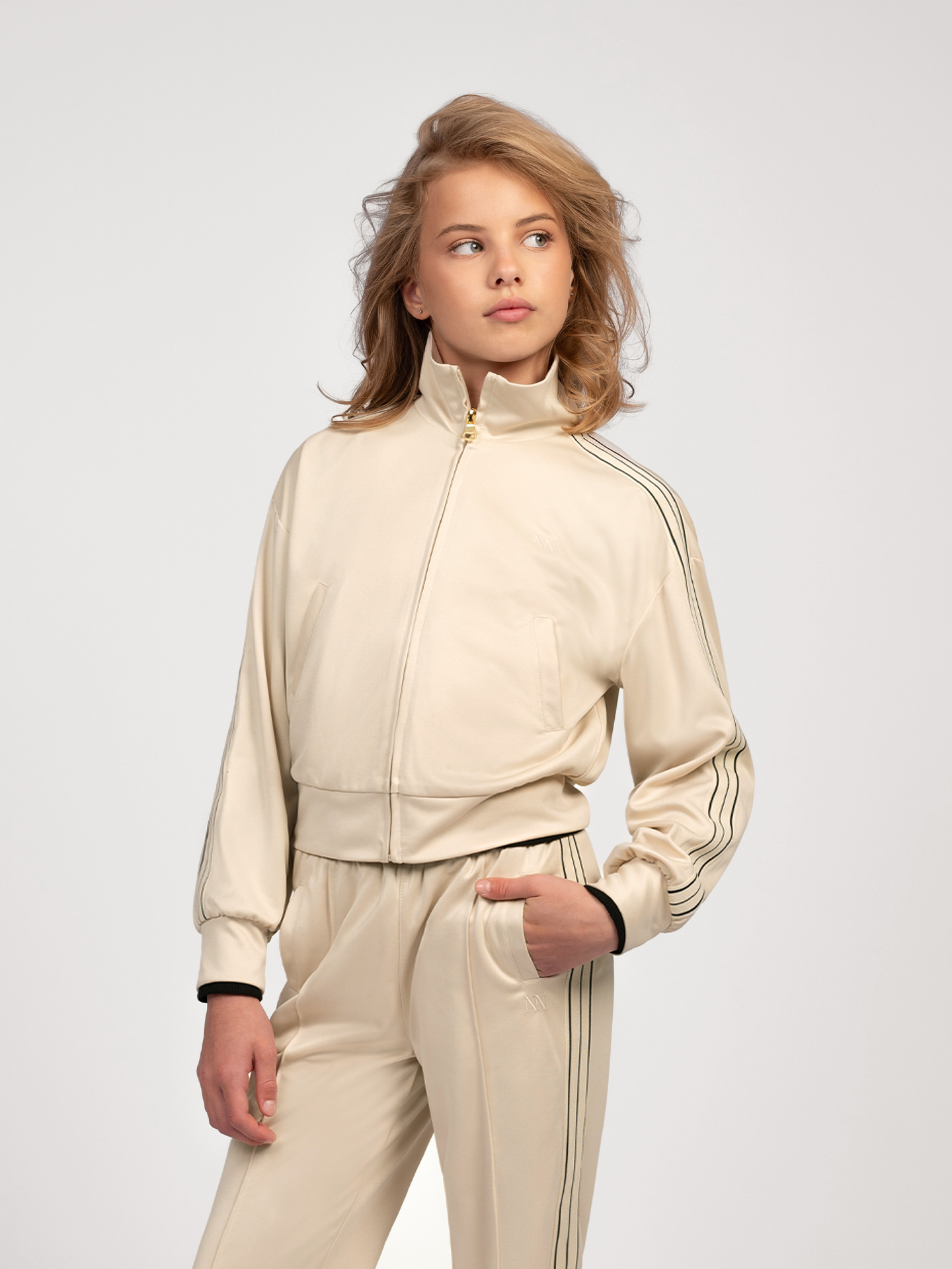 Track jacket with striped piping