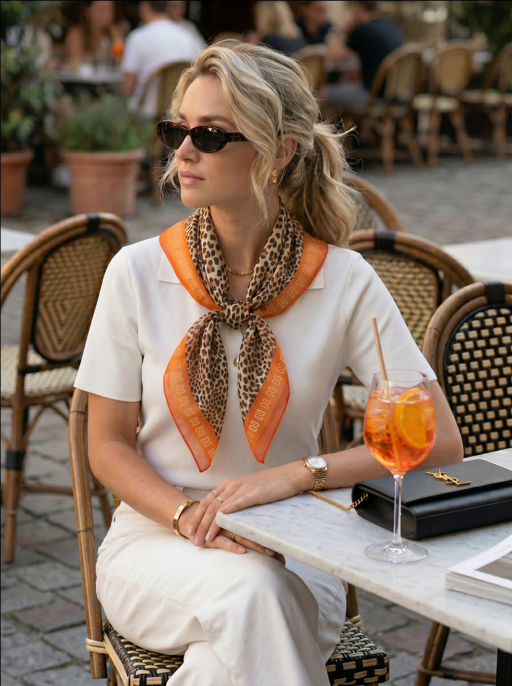 Oranje sjaal met luipaardprint 