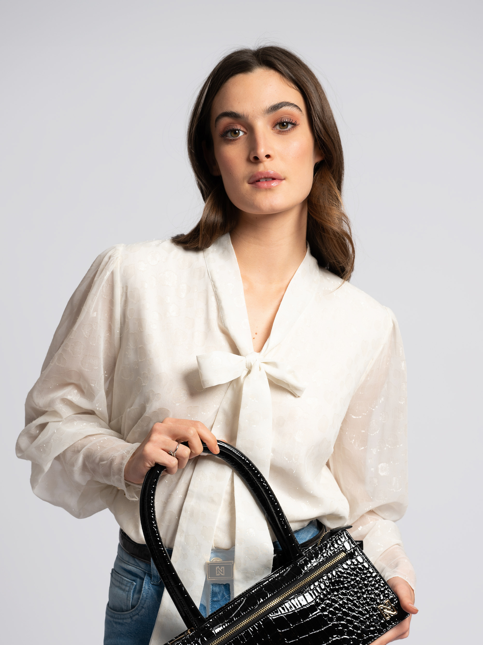 Blouse with tie closure at neck