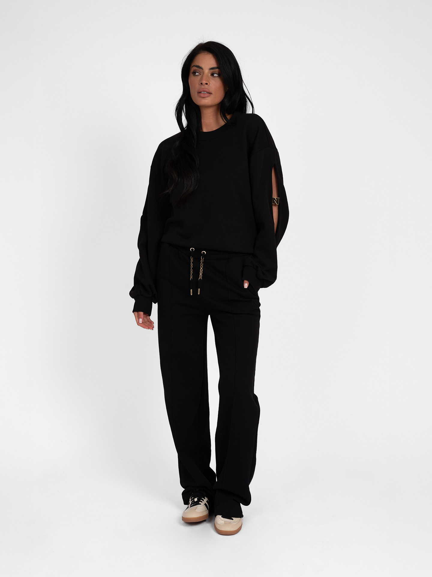 Sweatpants with chain details