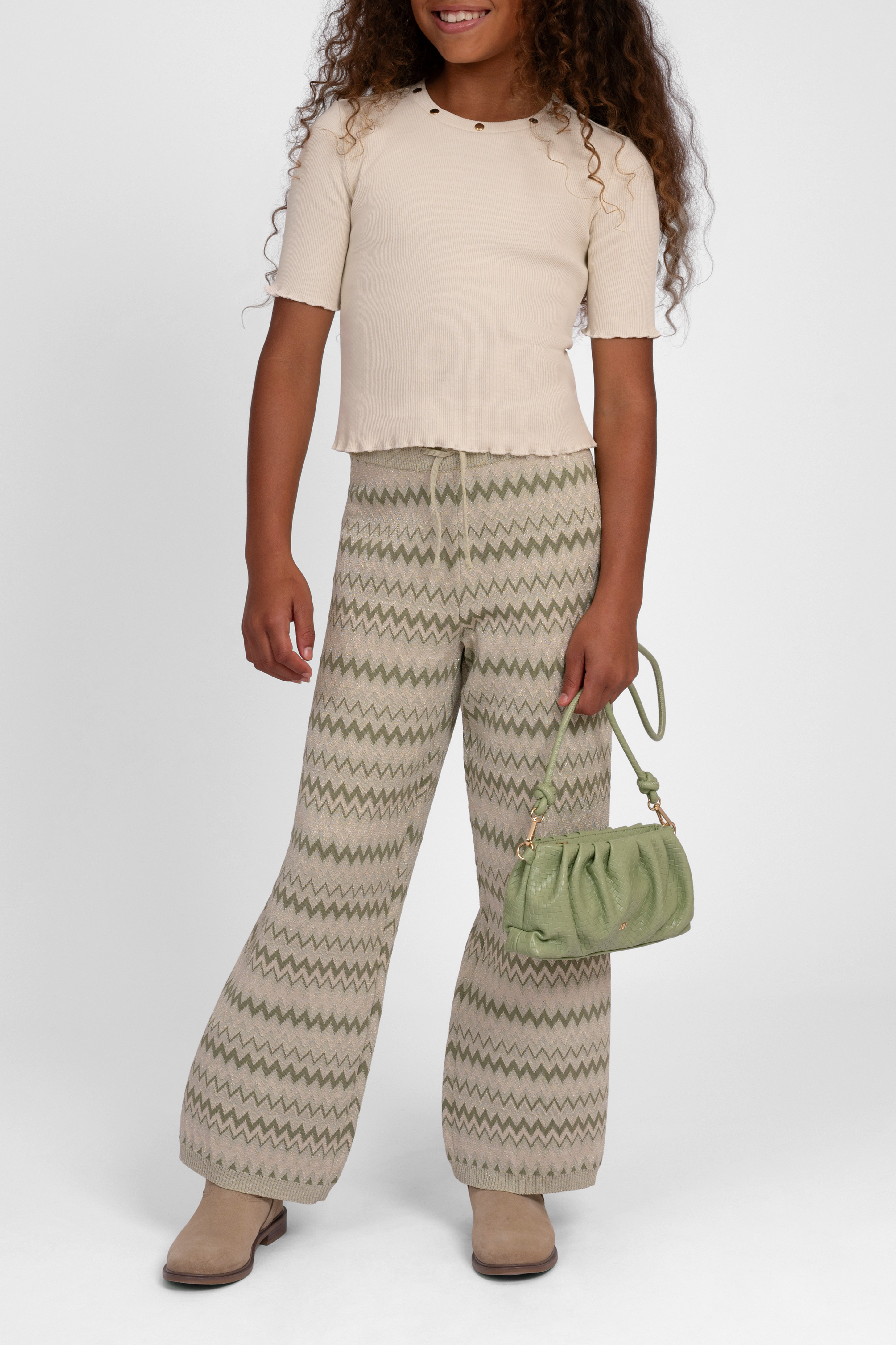 Trousers with zigzag pattern and glitter thread