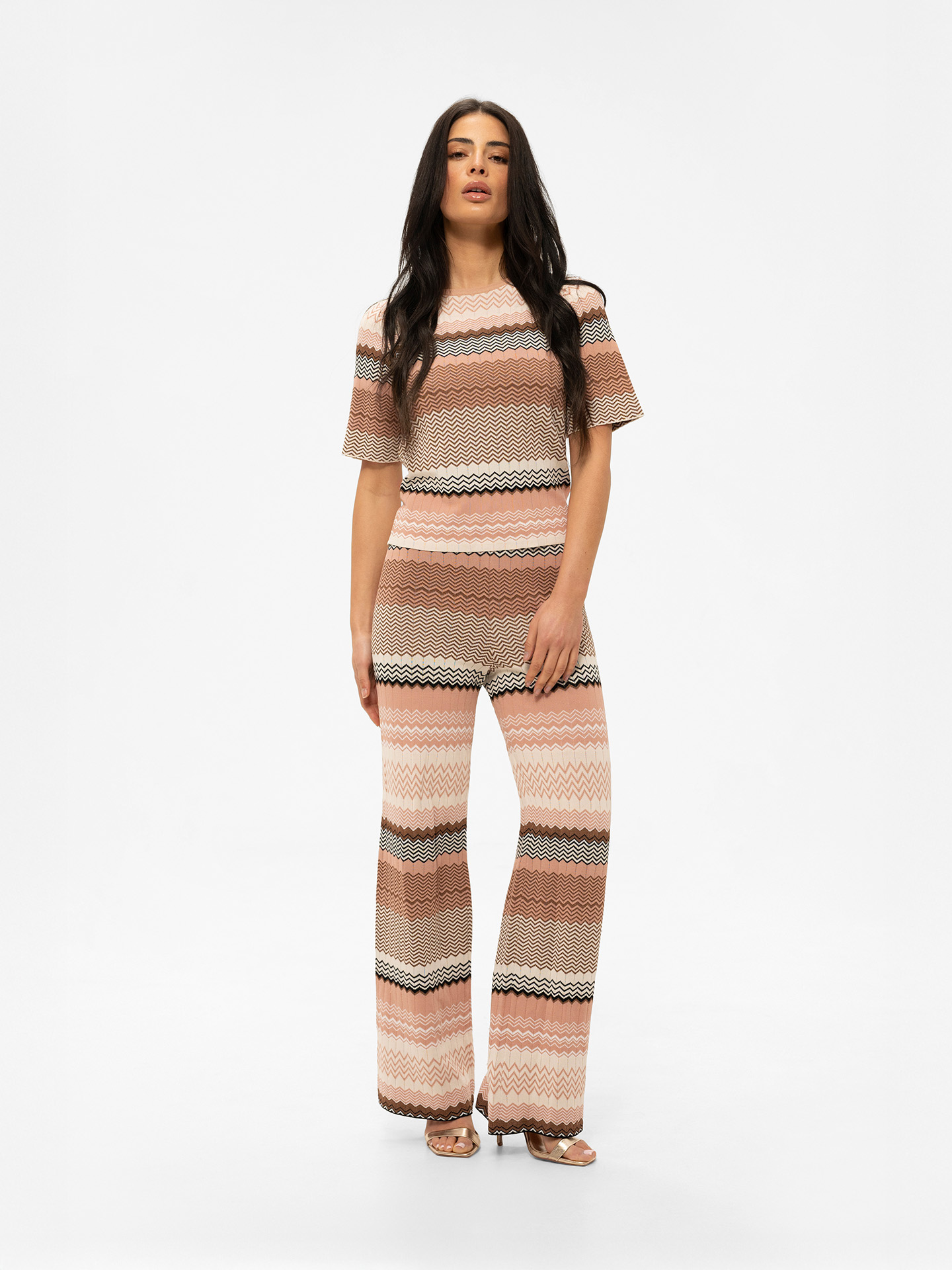 Pants with zigzag pattern and glitter thread