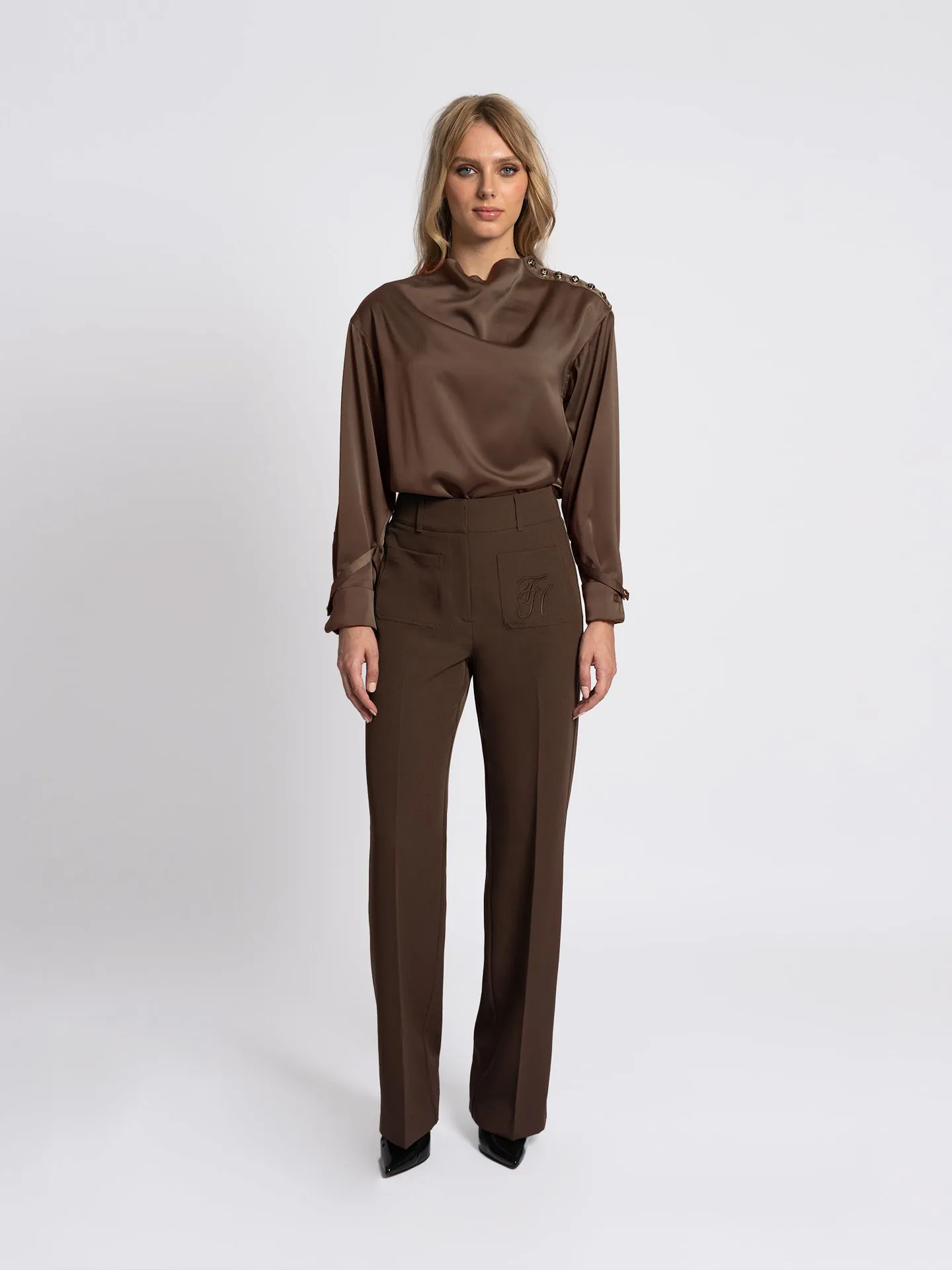 Pants with embroidered logo